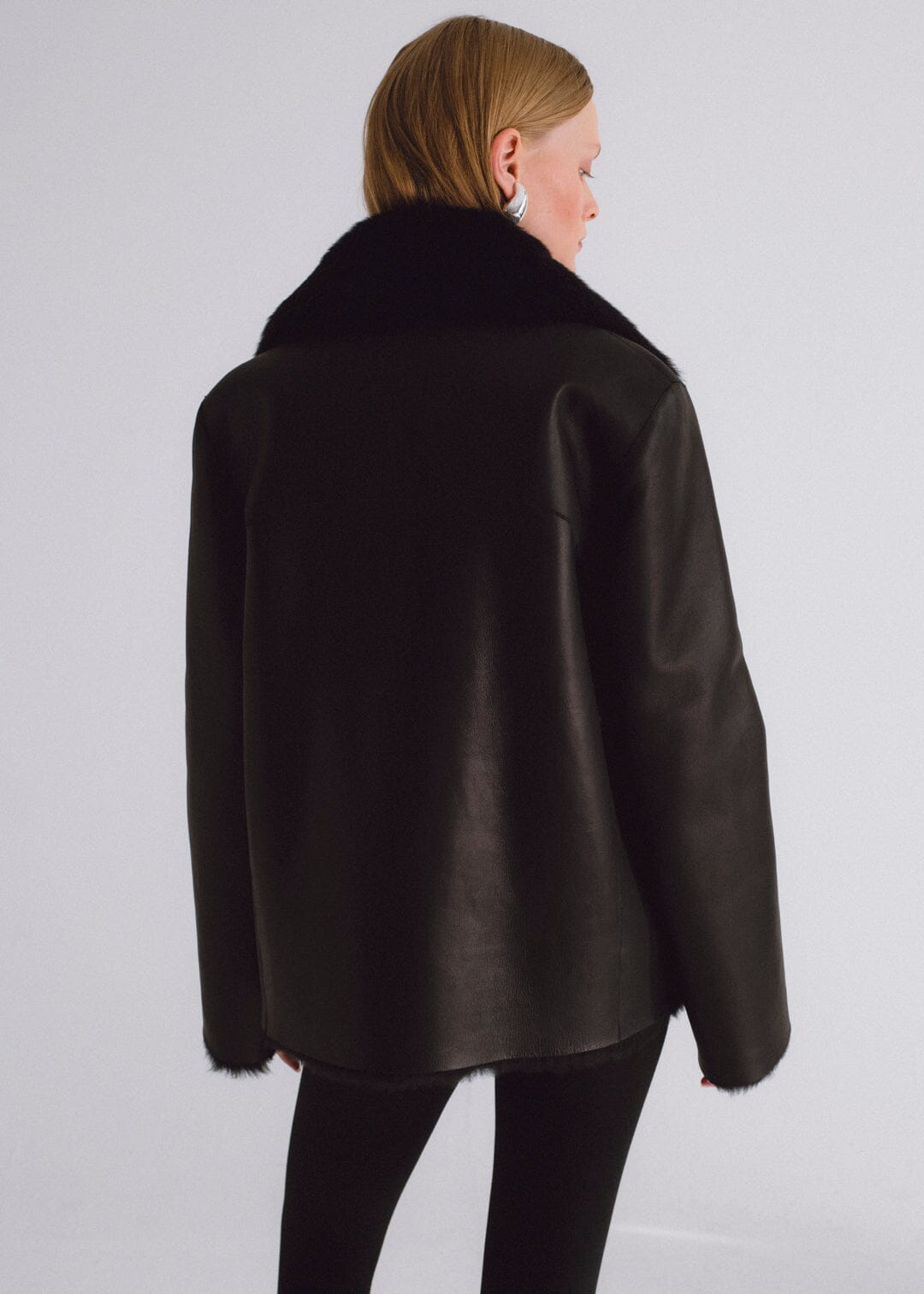 Chaqueta de pelo y piel napa negra