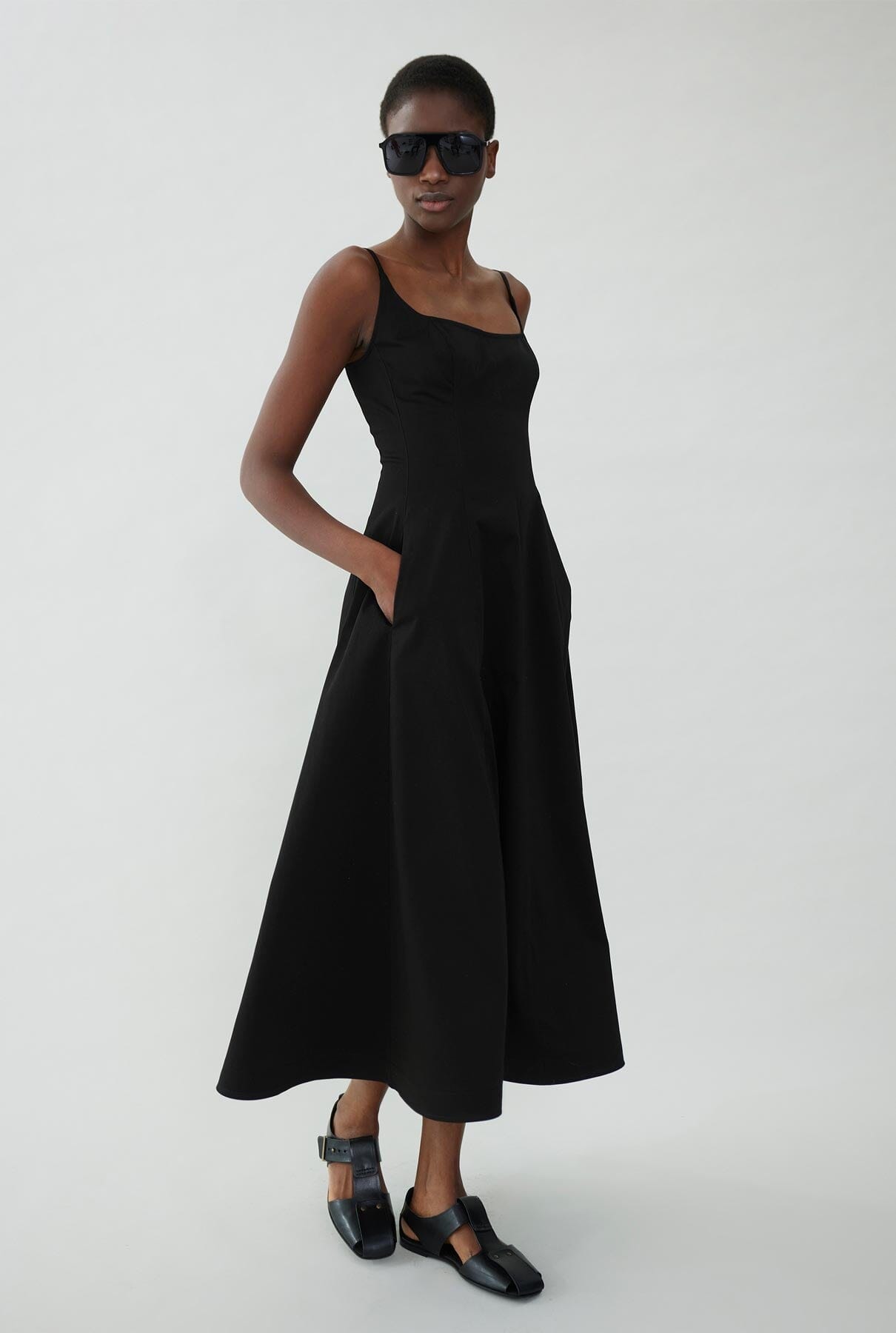 Cotton dress with straps and half-layer skirt