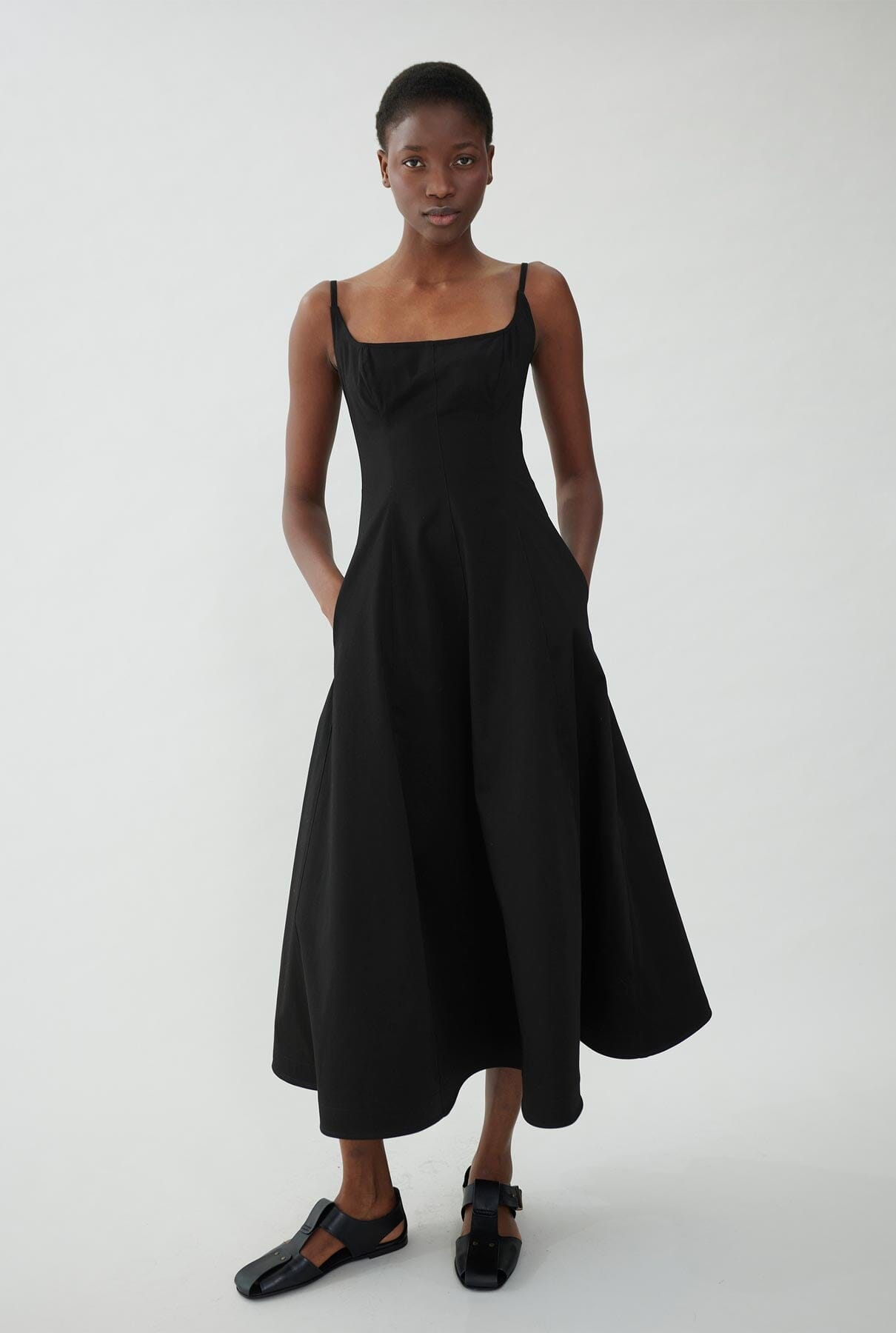 Cotton dress with straps and half-layer skirt