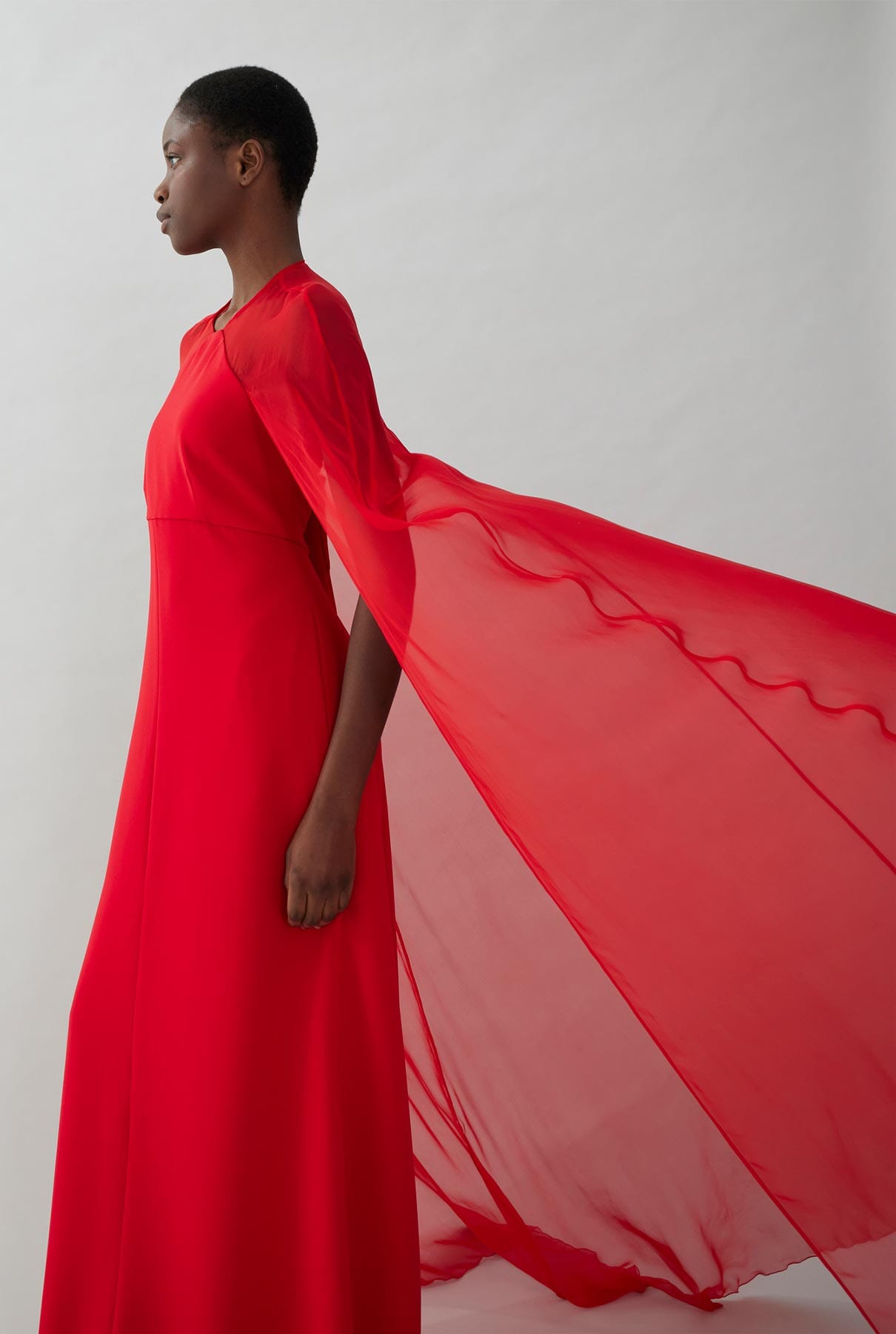 Crepe dress with long tulle sleeves